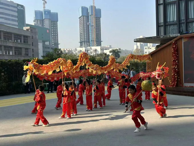 邻里寻年味，童心绘新春——珑门名苑幼儿园与桔塘社区共办迎新活动